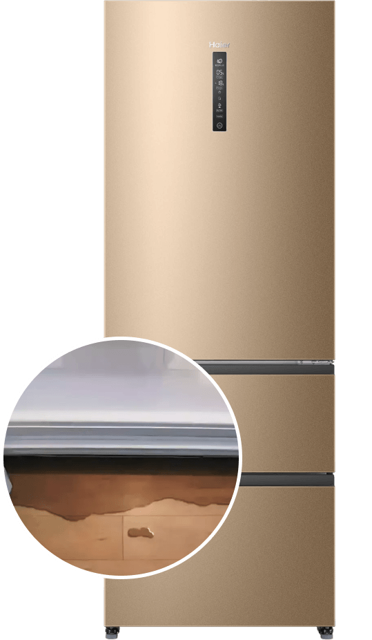 Течет холодильник Haier, под ним лужа